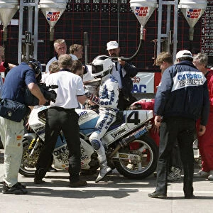 Pit stop action for Robert Dunlop (Oxford Ducati) 1993 Formula One TT