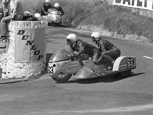 Artie & Edda Oates (BSA) lead Keith Griffin & Malcolm Sharrocks;1973 500cc Sidecar TT