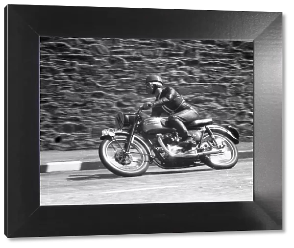 Travelling marshal Colin Broughton (Triumph) 1957 TT