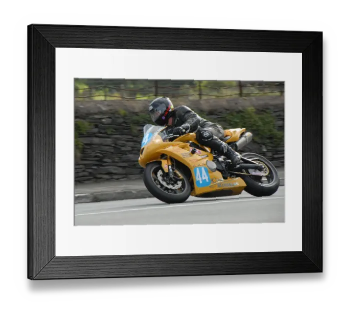 Framed Print : Carl Roberts (Triumph) 2009 Junior Manx Grand Prix Framed Print : Carl Roberts (Triumph) 2009 Junior Manx Grand Prix