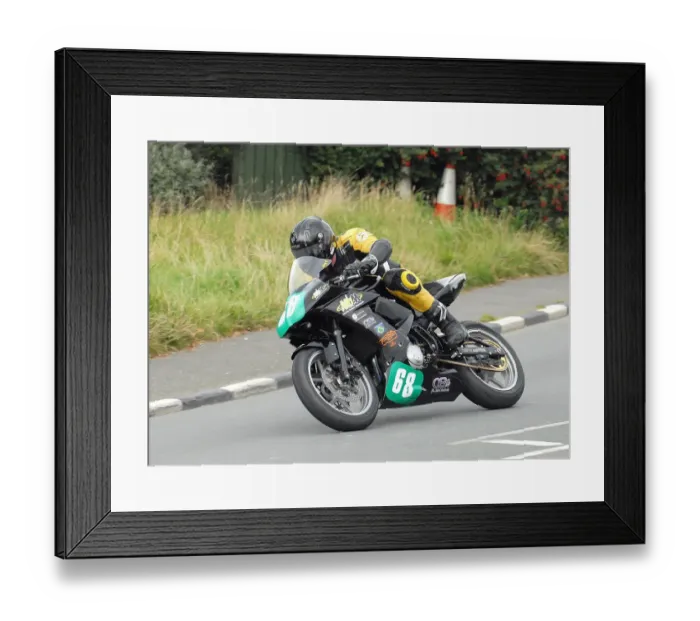 Framed Print : Jonny Heginbotham (Kawasaki) 2010 Ultra Lightweight Manx Grand Prix Framed Print : Jonny Heginbotham (Kawasaki) 2010 Ultra Lightweight Manx Grand Prix