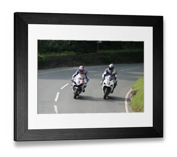 Framed Print : Adrian Archibald (TAS Suzuki) and Per Iver Breland (Suzuki) 2003 Formula One TT Framed Print : Adrian Archibald (TAS Suzuki) and Per Iver Breland (Suzuki) 2003 Formula One TT