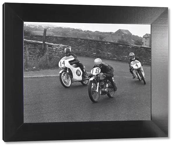 Brian Ball (Honda, 14), Mike Abraham (BSA, 18) and Cliff Carr (Bultaco, 4) 1964 Southern 100