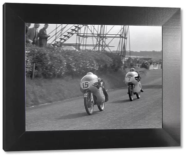 Gary Hocking (MZ, 15) leads Mike Hailwood (Ducati) 1959 Ultra Lightweight Ulster Grand Prix