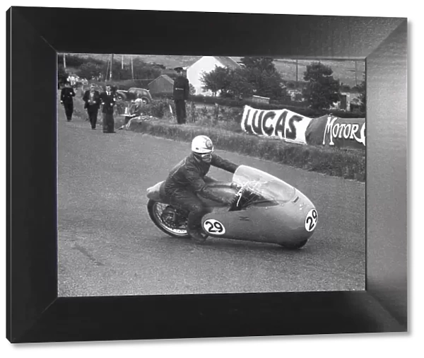 Derek Ennett (Guzzi) 1956 Junior Ulster Grand Prix practice