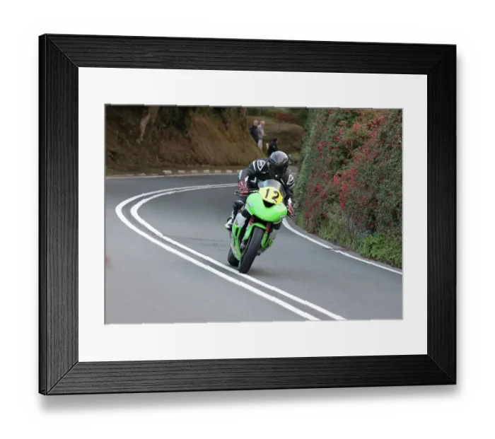Framed Print : Chris Co0k Kawasaki 2022 Senior Manx Grand Prix Framed Print : Chris Co0k Kawasaki 2022 Senior Manx Grand Prix