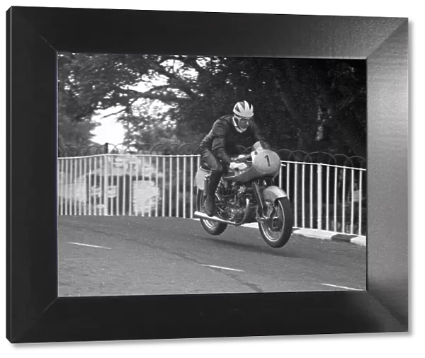 Bill Lomas (NSU) on Braddan Bridge, practicing for the 1953 Lightweight TT. He non-started the event after a spill