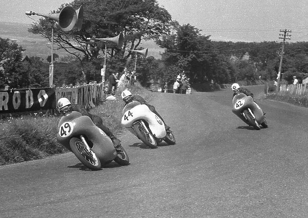Alistair King (AJS) Bob Brown (Norton) and Geoff Duke (Norton) 1959 Junior Ulster Grand Prix