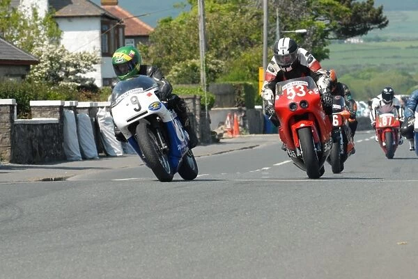 Chris McGahan (Triumph) and John Macfarlane (Suzuki) 2012 Pre TT Classic