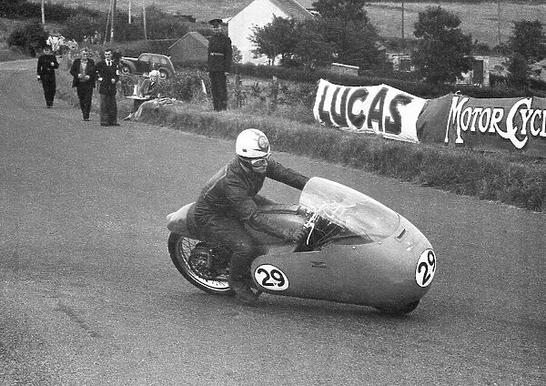 Derek Ennett (Guzzi) 1956 Junior Ulster Grand Prix practice