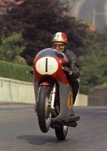 Giacomo Agostini (MV) on Ago's Leap. Quarter Bridge Road, 1970 Senior TT
