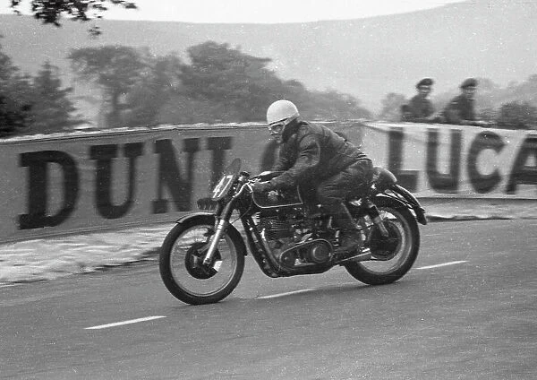 Jerseyman James Lanyon (AJS) on Ballaugh Bridge, 1954 Junior TT