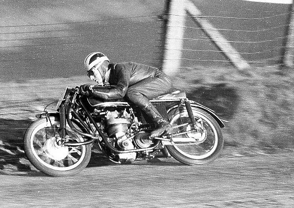 Bill Lomas (Earles Velocette) at Windy Corner, practicing for the 1952 Lightweight TT