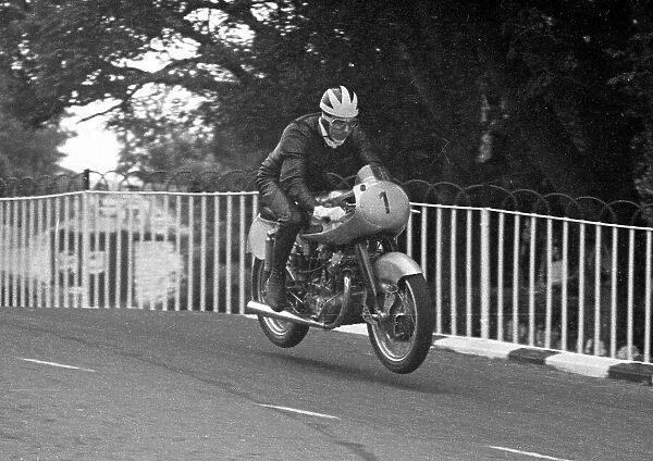 Bill Lomas (NSU) on Braddan Bridge, practicing for the 1953 Lightweight TT. He non-started the event after a spill