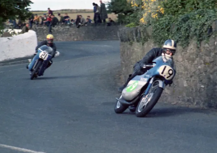 Framed Print : Peter Berwick (Suzuki) leads Alex George (Yamaha) 1969 Southern 100
