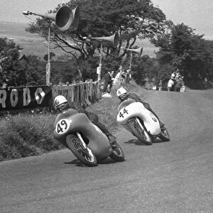 Alistair King (AJS) Bob Brown (Norton) and Geoff Duke (Norton) 1959 Junior Ulster Grand Prix