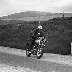 Angus Herbert (Triumph) Travelling Marshal 1956 TT
