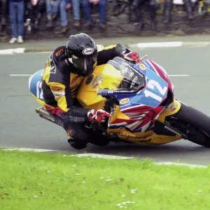 Bruce Anstey (Triumph) at Sulby Bridge, 2003 Junior TT