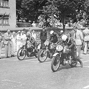 Derek Powell (BSA) John Clark (Norton, 32) H Walmsley (Norton) 1952 Junior Clubman TT