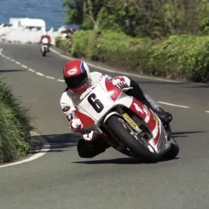 La première boucle au-dessus de 200 km/h : Steve Hislop ( Honda ) en Formule Un, Grand Prix du Tourist Trophy de l'année 1989 La première boucle au-dessus de 200 km/h : Steve Hislop ( Honda ) en Formule Un, Grand Prix du Tourist Trophy de l'année 1989