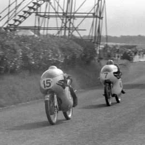 Gary Hocking (MZ, 15) leads Mike Hailwood (Ducati) 1959 Ultra Lightweight Ulster Grand Prix Gary Hocking (MZ, 15) leads Mike Hailwood (Ducati) 1959 Ultra Lightweight Ulster Grand Prix