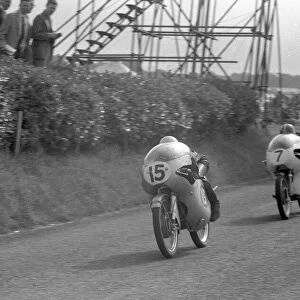 Gary Hocking (MZ, 15) leads Mike Hailwood (Ducati) 1959 Ultra Lightweight Ulster Grand Prix