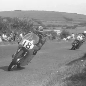 Mike Hailwood (Ducati) and Gary Hocking (MZ) 1959 Lightweight Ulster Grand Prix Mike Hailwood (Ducati) and Gary Hocking (MZ) 1959 Lightweight Ulster Grand Prix