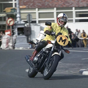 Mike Kneen (Honda) Travelling Marshal, 1983 Manx Grand Prix