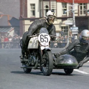 Peter Gerrish and P W Sharp (Vincent) leaves Parliament Square; 1967 Sidecar TT