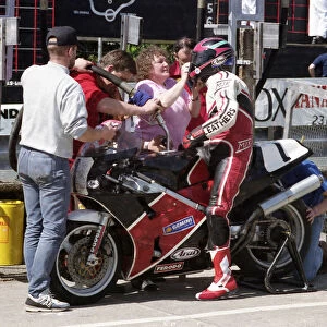 Pit stop action for Steve Ward (Honda) 1993 Formula One TT