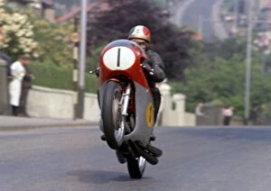 Images Dated 30th June 2011: Ago on Agos Leap Giacomo Agostini (MV) 1970 Senior TT