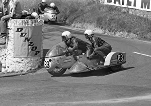 Images Dated 29th November 2015: Artie & Edda Oates (BSA) lead Keith Griffin & Malcolm Sharrocks;1973 500cc Sidecar TT