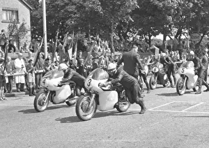 Bob McIntyre (Bianchi) and Derek Minter (Norton) 1961 Junior TT