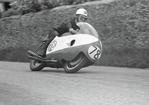 Images Dated 2nd July 2011: Bob McIntyre (Gilera) setting the first Ton lap of the TT