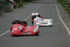 Brian Kelly & Andrew Scarffe (Molyneux) and Roger Stockton & Pete Alton (Shelbourne) 2003 Sidecar TT
