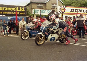 Images Dated 10th August 2016: Brian Reid (EMC) and Mark Johns (Yamaha) 1987 Junior TT