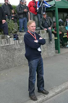 Images Dated 7th August 2021: Brian Reid watches the 2010 TT Parade