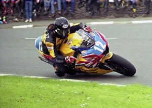 Triumph Collection: Bruce Anstey (Triumph) at Sulby Bridge, 2003 Junior TT