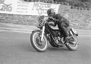 Images Dated 9th May 2021: Derek Ennett (AJS) 1952 Senior Manx Grand Prix