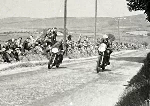 Images Dated 12th April 2020: Eddie Stidolph (Norton) and Syd Lawton (AJS) 1951 Senior TT