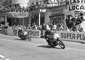 Images Dated 25th December 2021: Gustav Havel (Jawa) and Jack Ahearn (Norton) 1964 Junior TT