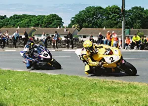 Images Dated 9th August 2018: Ian Lougher (Honda) and Bruce Anstey (Suzuki) 2004 Formula One TT