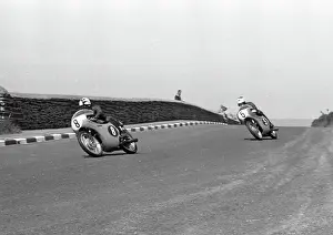 Irish ace Tommy Robb & Australian Tom Phillis (Honda) at Signpost Corner; 1962 Ultra Lightweight Junior TT