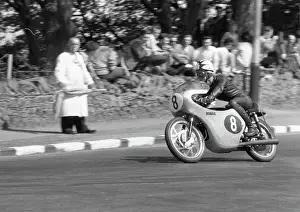 Irish ace Tommy Robb (Honda) at Quarter Bridge; 1962Utra Lightweight TT