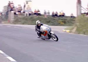 Irish ace Tommy Robb (Honda) at Signpost Corner; 1963 Junior TT
