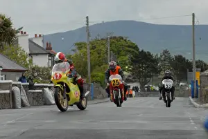 Jean-Pierre Sanchez (Spondon Yamaha) and Kevin Callan (Honda) and Edward Poole (Triumph) 2007 Pre TT Classic
