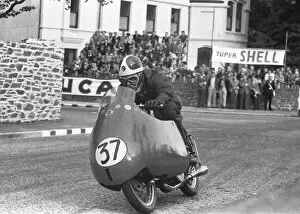 Images Dated 19th January 2022: Jim Baughan (Moto Guzzi) 1957 Lightweight TT