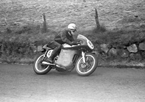 Images Dated 18th December 2021: Jimmy Buchan (Norton) 1958 Junior Ulster Grand Prix