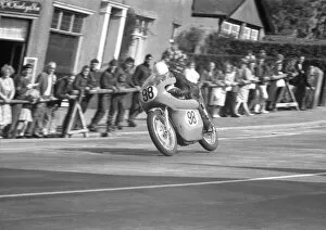 Images Dated 18th February 2022: Jimmy Guthrie jnr (Norton) 1963 Senior Manx Grand Prix