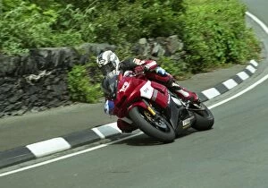 Images Dated 10th July 2011: John McGuinness in Stella Maris action, 2004 Junior TT